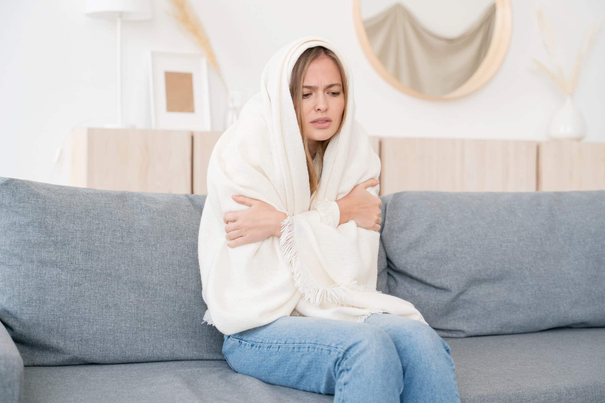 Freezing Without Hot Water A Woman in Need of Water Heater Repair!