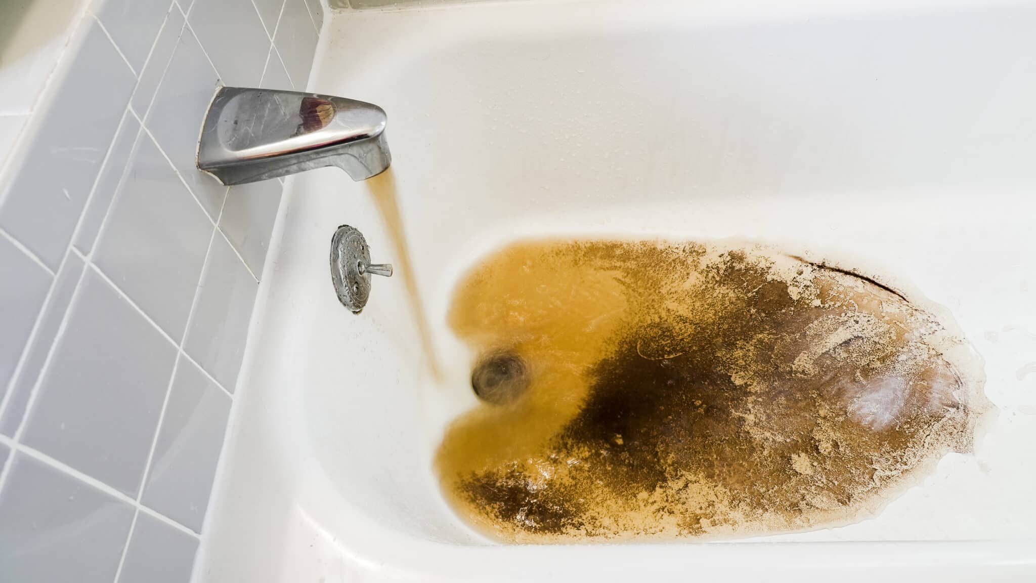 Discolored water draining from bathtub, Water Heater.